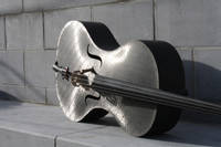 Carbon Fibre Cello on Wall Thumbnail