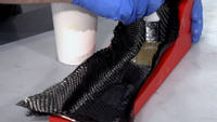 Hand-laminate the carbon fibre part