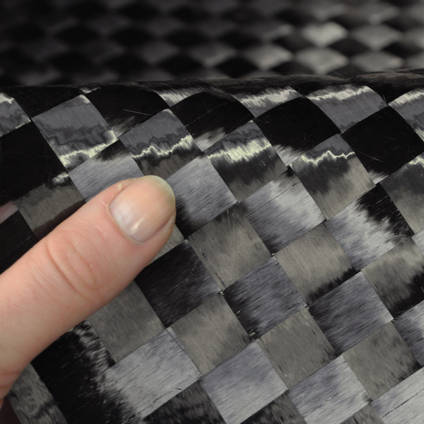 15mm Spread-Tow Plain Weave Carbon Fibre Cloth In Hand Closeup