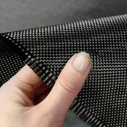 210g Plain Weave 3k Carbon Fibre Cloth In Hand Closeup