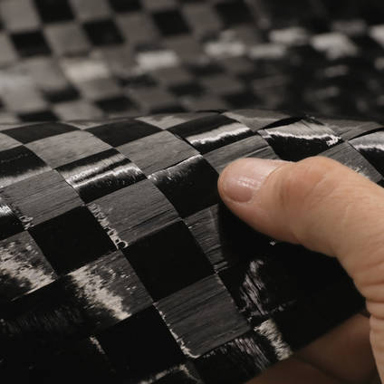 18mm Spread-Tow Plain Weave Carbon Fibre Cloth in hand