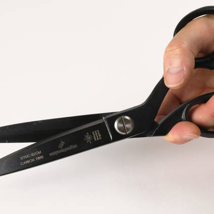 Professional 10 Inch Carbon Fibre Composites Shears in Hands