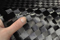 15mm Spread-Tow Plain Weave Carbon Fibre Cloth In Hand Closeup Thumbnail